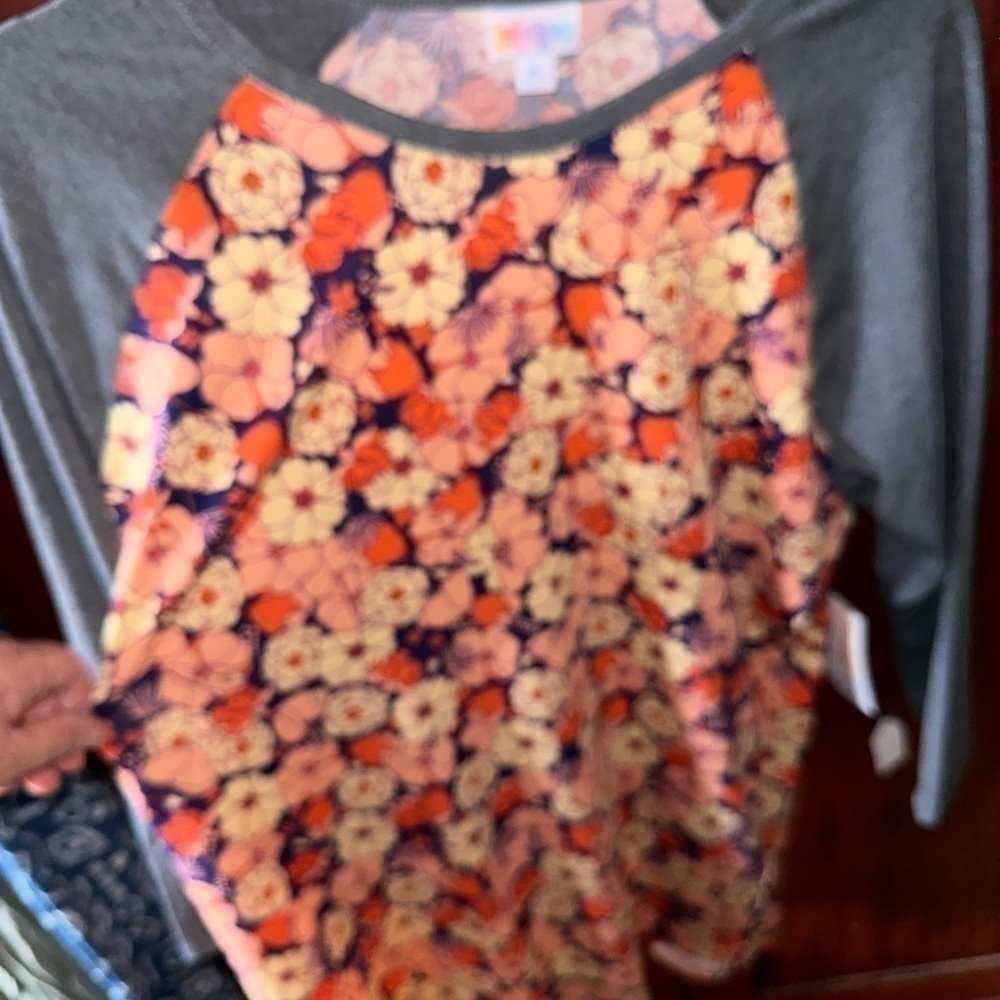 Lularoe XL Purple Randy T with peach floral pattern. Grey‎ raglan sleeves. NWT .